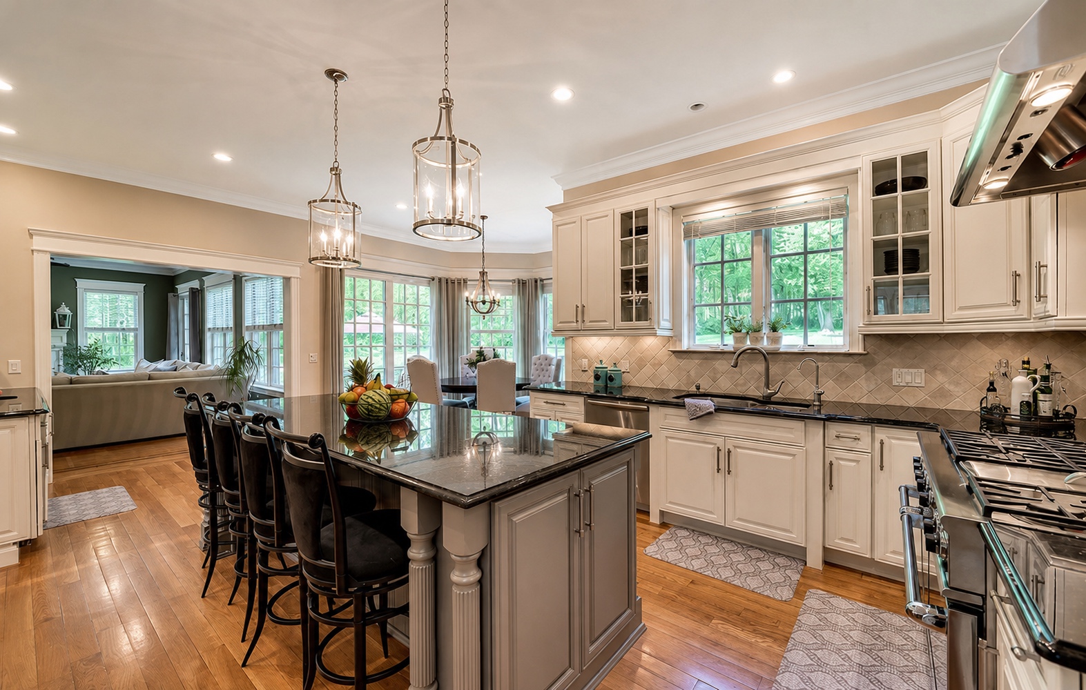 White perimeter cabinets paired with a grey refinished island