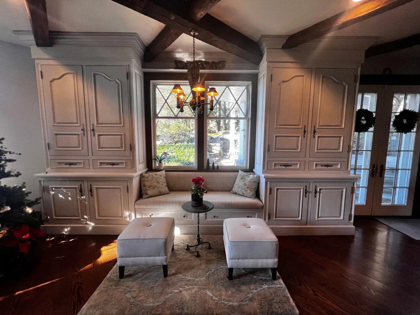Interior painted family room with custom built-in cabinetry, shelving, and trim by Genesis Pro Painting